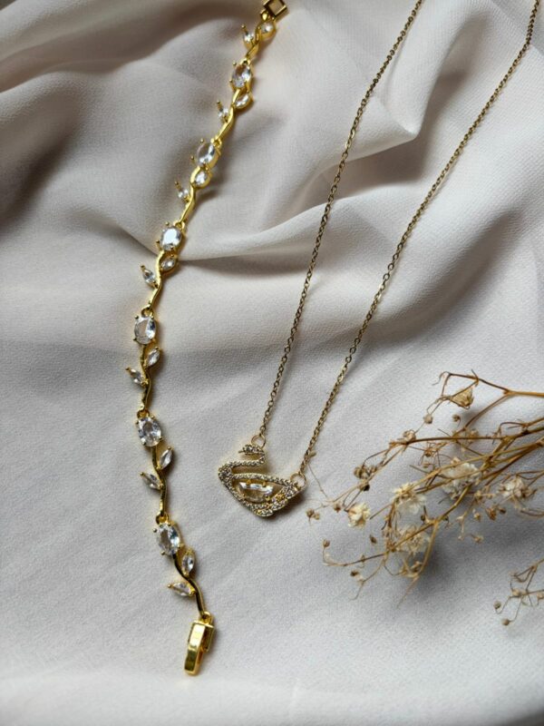 Duo Éclat de Soie – Collier Cygne & Bracelet Feuillage